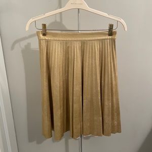 Pleated gold faux leather skirt